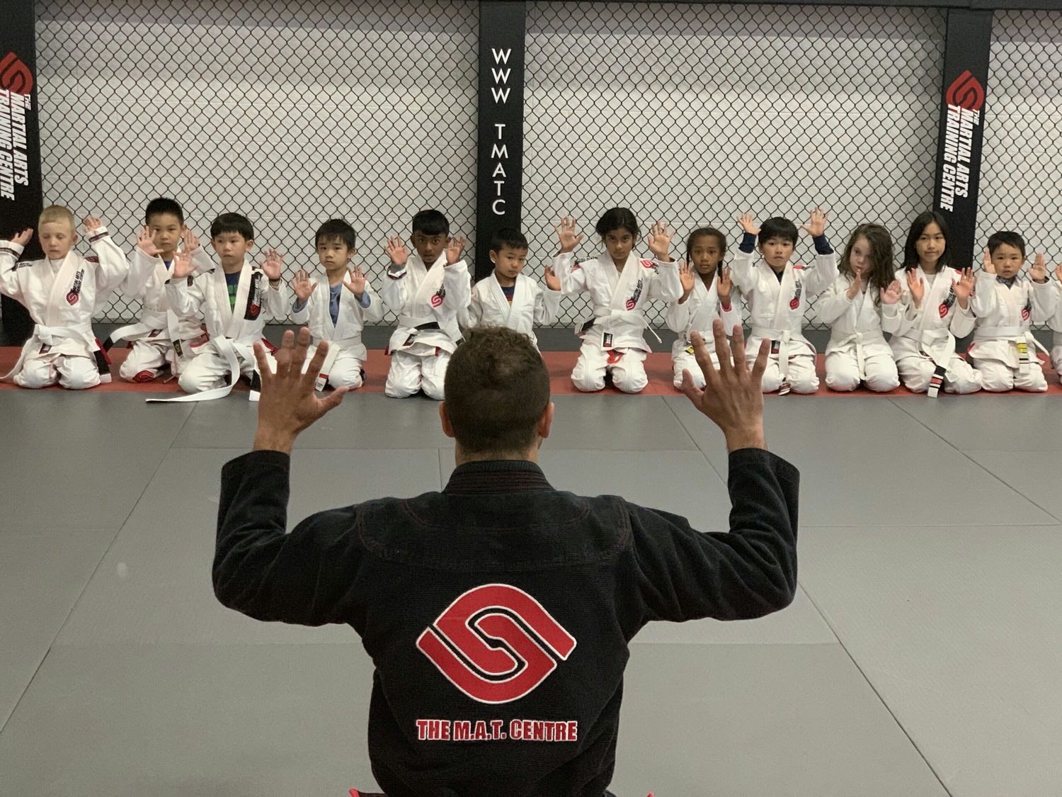 TMATC instructor working with children